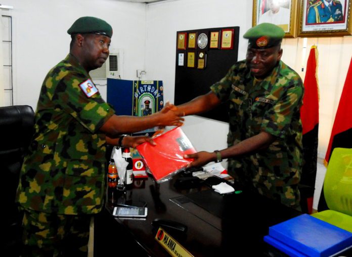 Col Sagir Musa being received by the commandant NASPRI, Col Mustapha Anka