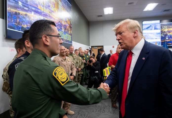 US President Donald Trump greets first responders as he visits El Paso Regional Communications Center in El Paso, Texas, August 7, 2019, following last weekend's mass shootings. (Photo by SAUL LOEB / AFP) (Photo credit should read SAUL LOEB/AFP/Getty Images)