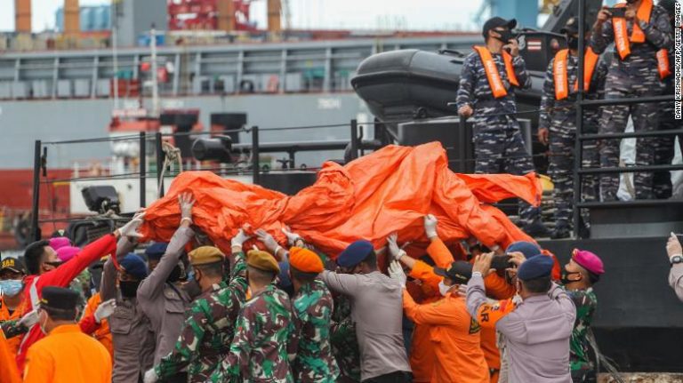 amilies, friends of Indonesia plane crash passengers await news