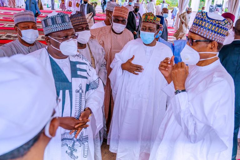 President Muhammadu Buhari and members of the immediate family observe  the Eid Al-Fitr prayer in the presidential villa