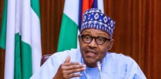 Buhari cautions contractors and businesspeople against bribery.