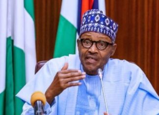 Buhari cautions contractors and businesspeople against bribery.