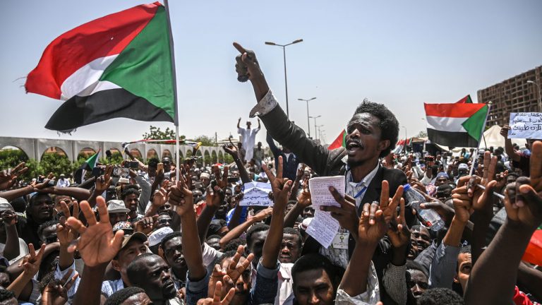 Sudanese defiantly march against coup, killing three people