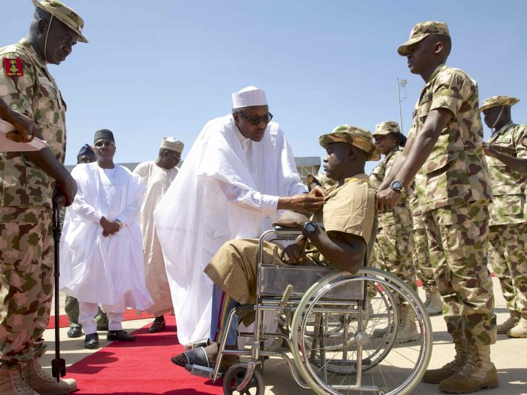 In Borno, Buhari promises to support  families of dead and wounded soldiers