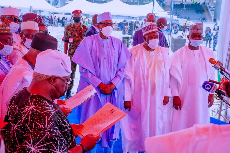 Photos: Buhari attends swearing-in of APC national working committee