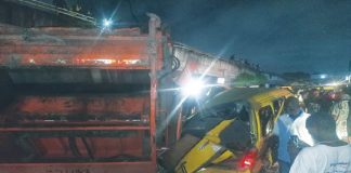 Refuse truck falls off Lagos bridge, kills tricycle rider