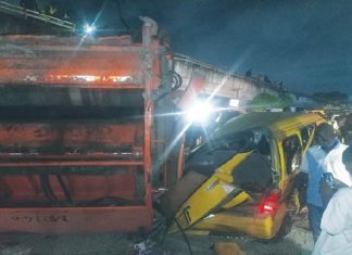 Refuse truck falls off Lagos bridge, kills tricycle rider