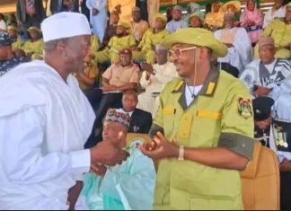 Sokoto State Governor, Ahmed Aliyu exchanging pleasantries with former governor, Attahiru  Bafarawa