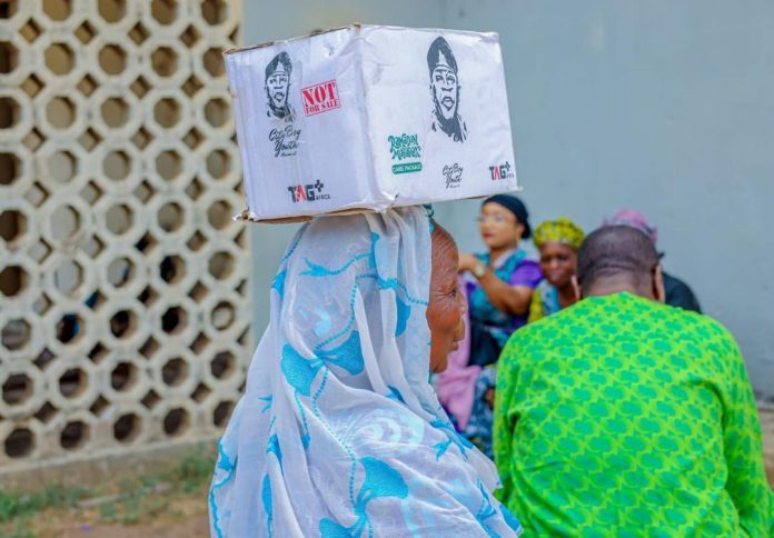 Tinubu's supporters distribute 50,000 food boxes to poor