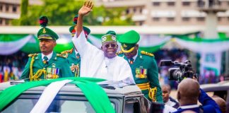 [VIDEO] Tinubu slips while boarding presidential parade vehicle at Eagles Square