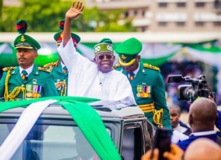 [VIDEO] Tinubu slips while boarding presidential parade vehicle at Eagles Square