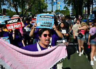 Disneyland workers threaten strike action over wages