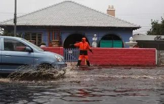 Flooding, winds batter South Africa's Cape Town