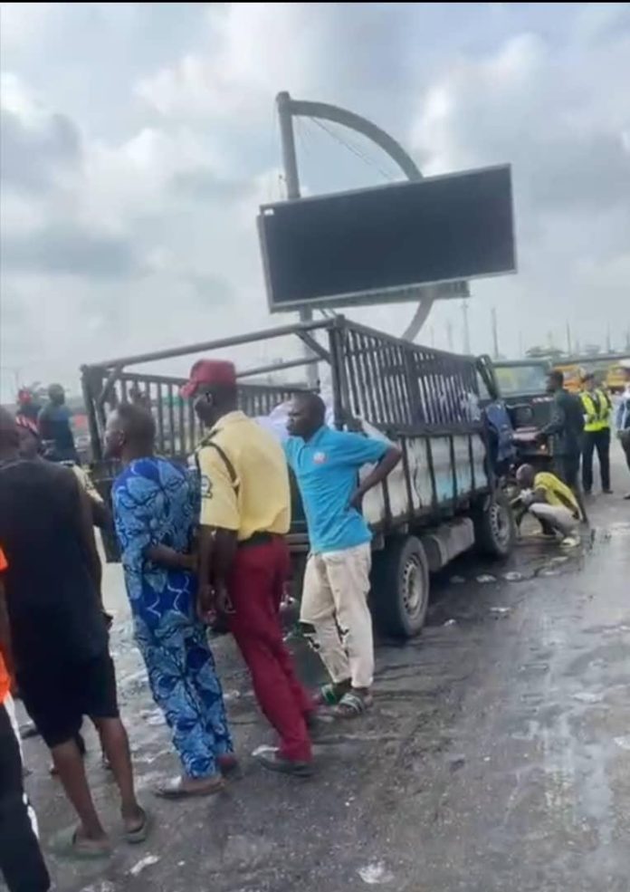 LASTMA rescues two accident victims trapped under mini truck