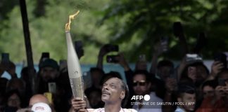 Snoop Dogg Ignites flame as Paris prepares for opening ceremony