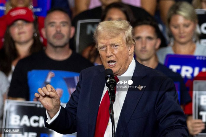 Trump attacks Kamala Harris in first rally after Biden exit