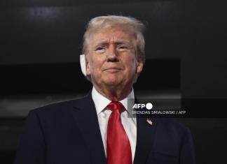 Trump attends Republican convention with bandaged ear after assassination attempt