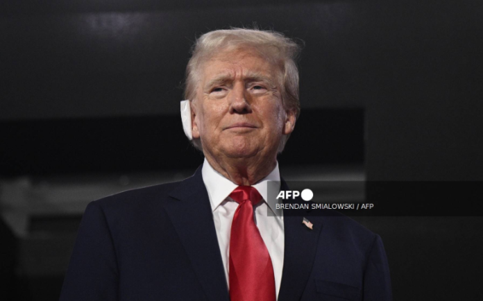 Trump attends Republican convention with bandaged ear after assassination attempt