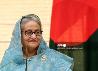 Bangladesh PM flees as protesters storm palace