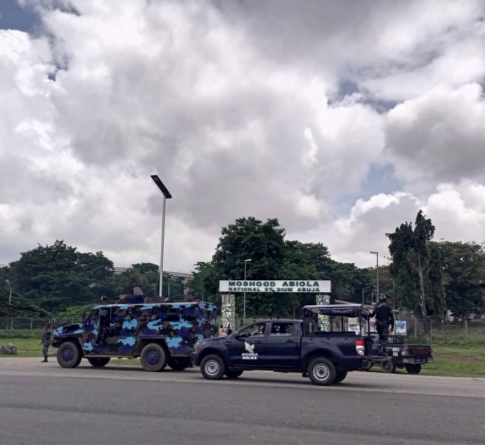 Police barricade Abuja stadium with vehicles