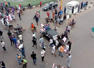 Protesters burn NSCDC vehicle, vandalise properties in Katsina