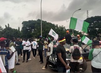 Protesters desert Abuja national stadium, assemble at Berger