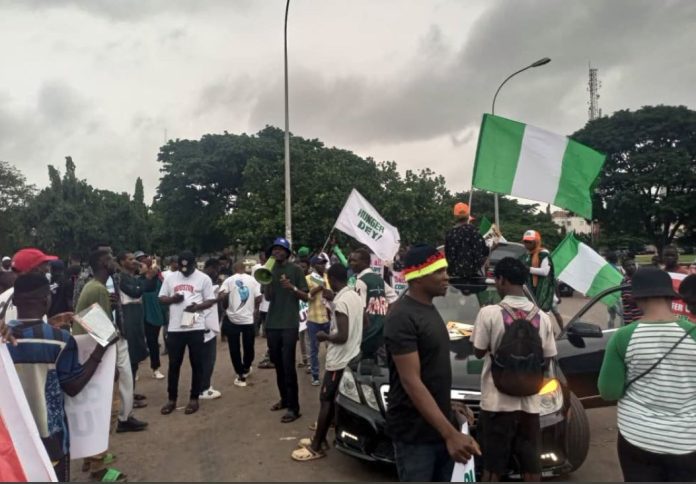 Protesters desert Abuja national stadium, assemble at Berger