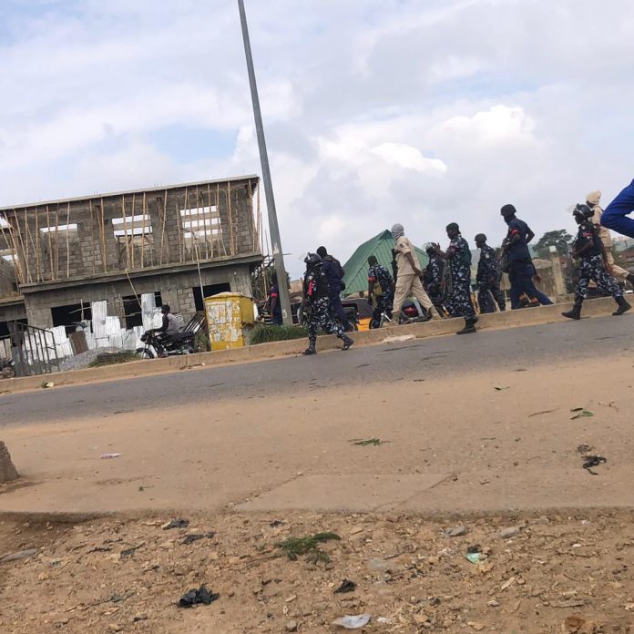 Security operatives disperse protesters in Abuja, arrest three