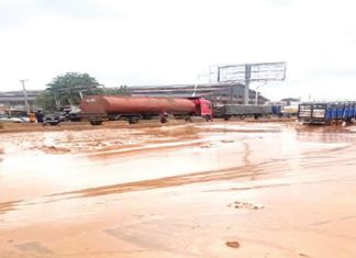 Commuters demand repair of collapsed Asaba-Onitsha Road