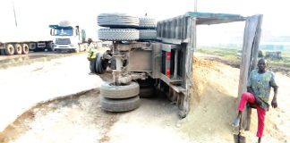 Driver, motor boy escape death as truck tumbles in Ogun