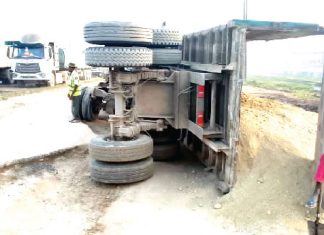 Driver, motor boy escape death as truck tumbles in Ogun